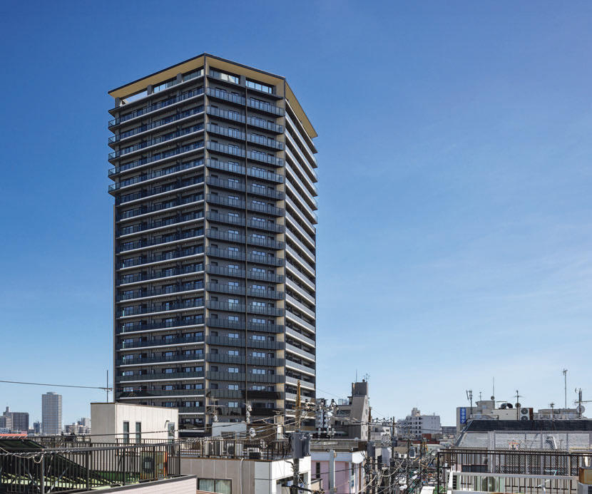 袖壁と庇の形状で、まちの新たな「GATE」を表現したファサード